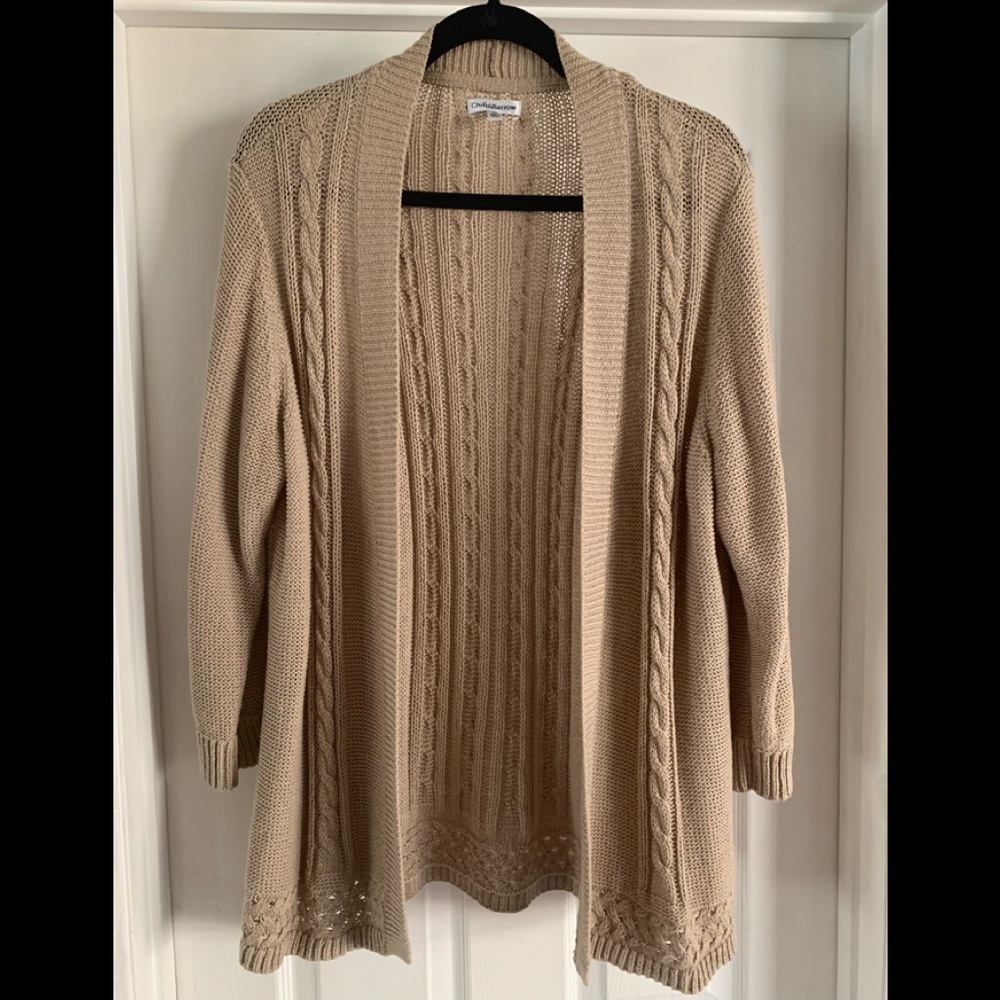 Tan women’s overpiece sweater